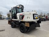 2010 Caterpillar M316D wheel excavator, rear three-quarter view