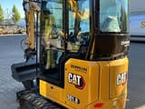 2022 Caterpillar 301.8 mini excavator, rear three-quarter view