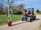 2015 Takeuchi TB295W wheel excavator side view