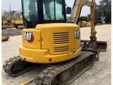 2021 Caterpillar 305E2 crawler excavator, rear three-quarter view
