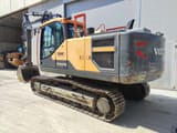 2016 Volvo EC220ENL crawler excavator, rear three-quarter view