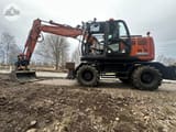 2018 Hitachi Zaxis 140W wheel excavator side view