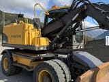 2009 Volvo EW140C wheel excavator, side view
