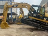 2018 Caterpillar 320CL crawler excavator, side profile view