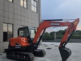 2024 Doosan DX60-9C mini excavator, side view