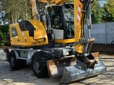 2017 Liebherr A914 COMPACT wheel excavator, front three-quarter view