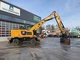2016 Caterpillar MH3022 wheel excavator side view