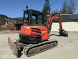2017 Kubota KX057-4 mini excavator, rear three-quarter view