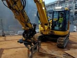 2022 Komatsu PC88MR-11EO mini excavator, side view with fork attachment