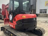 Kubota U55-4 crawler excavator, front three-quarter view
