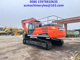 2023 Doosan DX300LC-9C crawler excavator, rear three-quarter view