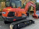 2020 Doosan DX60-9C crawler excavator, rear three-quarter view