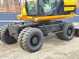 2011 JCB JS145W wheel excavator side view