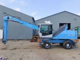 2010 Fuchs MHL 331 material handler, side view