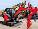 Hitachi ZX55USR-5A mini excavator, front three-quarter view