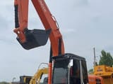 2024 Hitachi Zaxis 210 crawler excavator, front three-quarter view