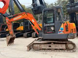 2024 Doosan DH55 crawler excavator, side view