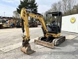 2016 Caterpillar 302.7DCR mini excavator, front three-quarter view