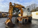 1982 Poclain P60 wheel excavator, side view