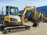 2006 New Holland E50.2C mini excavator, rear three-quarter view