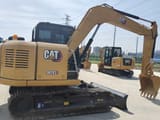 2023 Caterpillar 307E2 excavator, side view
