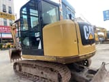 2022 Caterpillar 307E crawler excavator, rear three-quarter view
