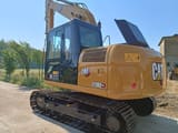 2023 Caterpillar 313D2 GC crawler excavator, rear three-quarter view