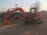 2023 Doosan DH55 mini excavator, side profile view