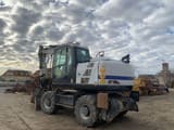 2018 JCB JS145W wheel excavator, rear three-quarter view