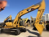 2010 Caterpillar 320BL crawler excavator side view