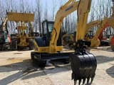 2025 Komatsu PC55 mini excavator, front-quarter view