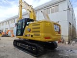 Caterpillar 320GC crawler excavator, rear three-quarter view