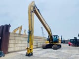 2024 Caterpillar 330 crawler excavator, front three-quarter view