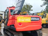 2023 Doosan DX140LC-5C crawler excavator, rear three-quarter view