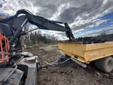 2016 Volvo EW160E wheel excavator with trailer, rear view