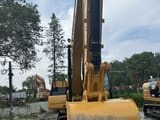 2020 Caterpillar 320GC crawler excavator, front view of bucket and boom
