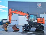 2015 Hitachi Zaxis 140W wheel excavator, side profile view