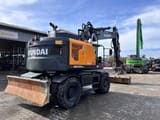 2023 Hyundai HW170ACR wheel excavator rear three-quarter view