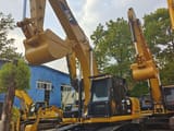 2025 Caterpillar 329D crawler excavator, front three-quarter view