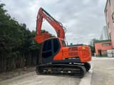 2023 Doosan DX150LC-9C crawler excavator, side profile view