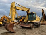 1998 Komatsu PW170ES wheel excavator, front three-quarter view