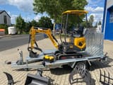 Berger Kraus BK1000JS mini excavator on trailer, side view