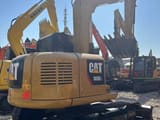 2024 Caterpillar 308E2 crawler excavator, rear three-quarter view