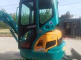 2023 Kubota U25 mini excavator, side profile view