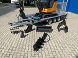 Berger Kraus BK2800ASR mini excavator on trailer with attachments