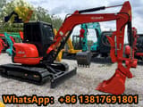 2024 Kubota U55-4 mini excavator, side profile view