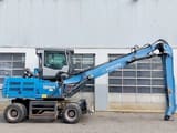 2015 Fuchs MHL 334 E material handler, side view