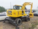 2023 Komatsu PW160W-7 wheel excavator, rear three-quarter view