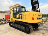Komatsu PC160 crawler excavator, rear three-quarter view