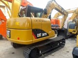 2020 Caterpillar 307D mini excavator, rear three-quarter view